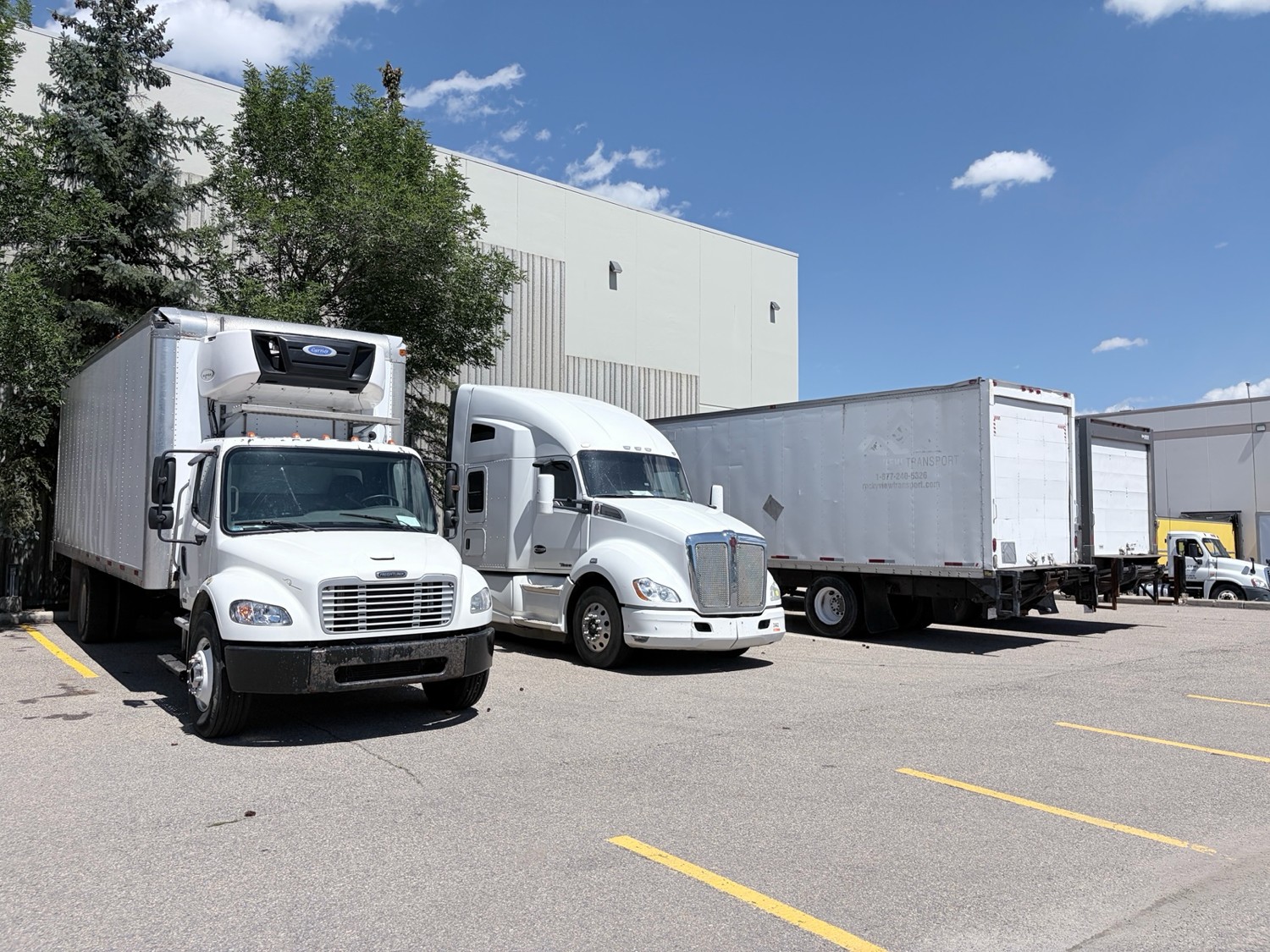 Intact Courier trucks running the Calgary to Vancouver freight lane